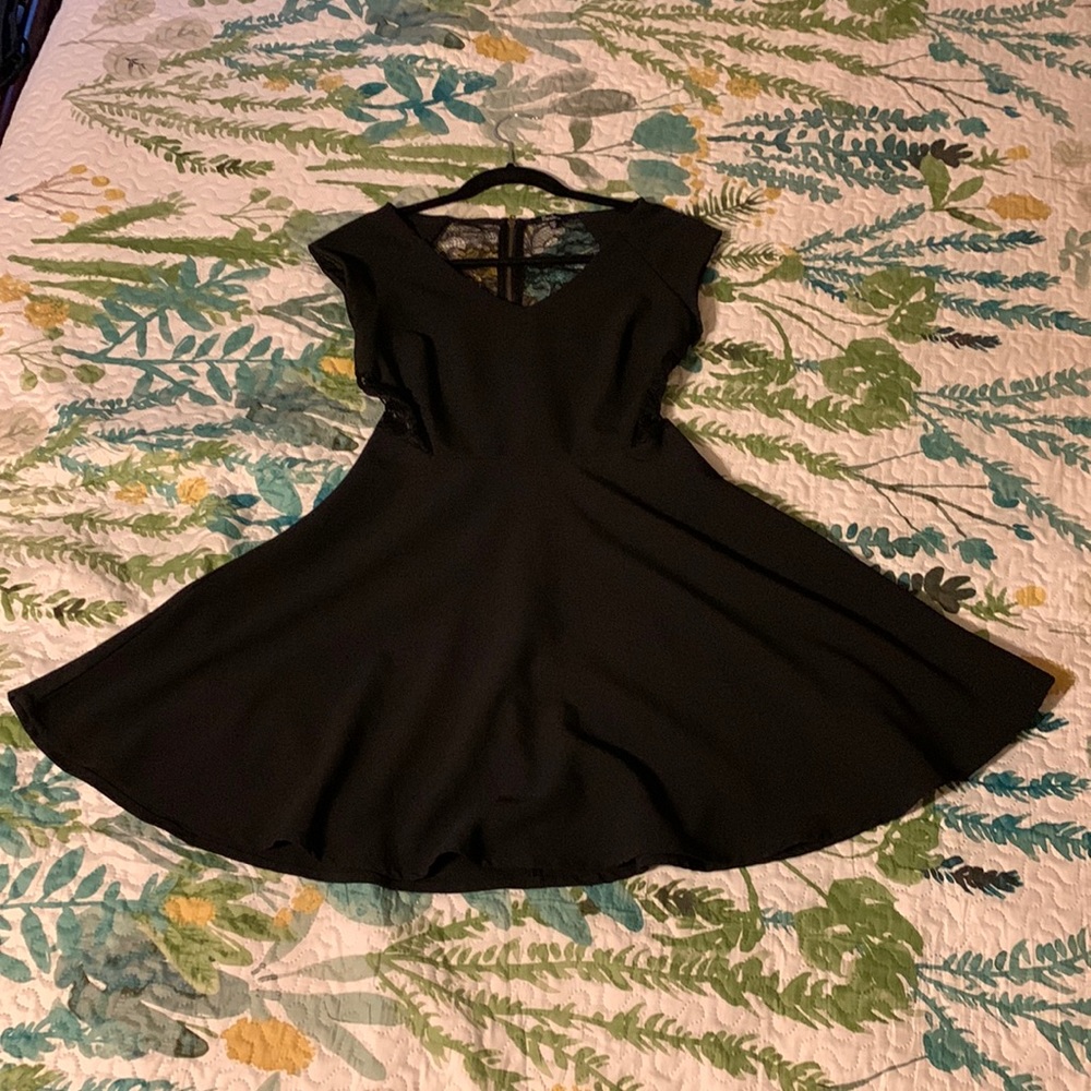 Black v neck dress with lace back and side inserts